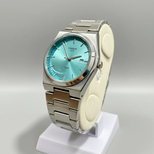 Side view of Tissot PRX 35mm Silver Edition watch – Tiffany Blue Dial