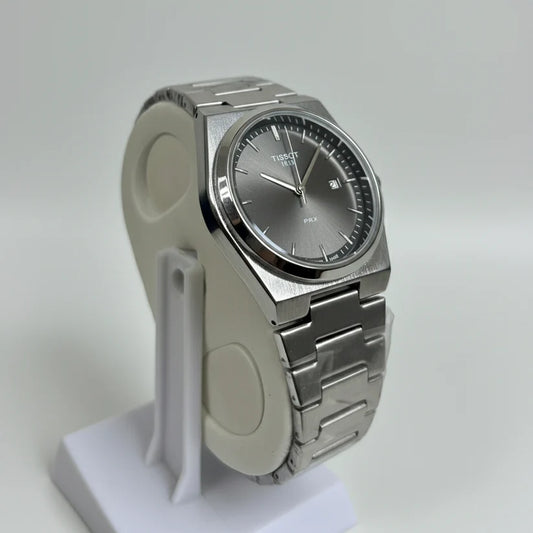 Side view of Tissot PRX silver stainless steel watch black dial